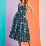 Sleeveless teal fit-and-flare midi dress with pastel ice cream cone pattern