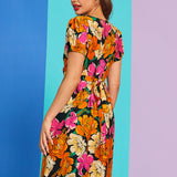 Side angle of retro floral print summer dress with puff sleeves and pockets