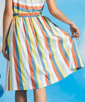 Back view of gathered pastel stripe skirt with elasticized waistband