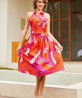 Full outfit view with matching halter top and flared silhouette