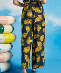 Back view of tropical wide-leg palazzo pants with elasticized waistband