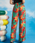Back view of tropical floral palazzo trousers with elasticized waistband