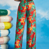 Back view of tropical floral palazzo trousers with elasticized waistband