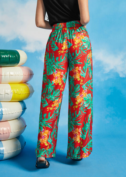 Back view of tropical floral palazzo trousers with elasticized waistband