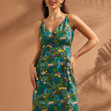 Front view of vintage-inspired jungle print midi dress with faux-wrap neckline.