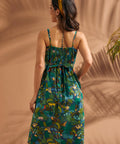 Back view of jungle print dress with smocked panel and self-tie waist sash.