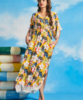 Woman in a yellow floral dress with pockets