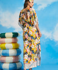 Back view of tropical floral maxi dress with keyhole tie detail