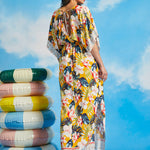 Back view of tropical floral maxi dress with keyhole tie detail