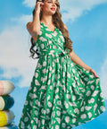 Emerald green vacation dress with ivory shell print and breezy retro-inspired fit