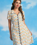 Woman wearing vintage-inspired sardine print dress with pockets and button front