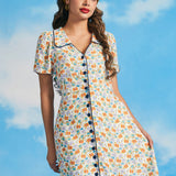 Woman wearing vintage-inspired sardine print dress with pockets and button front