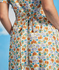 Back tie waist detail on novelty fish print vintage-inspired dress