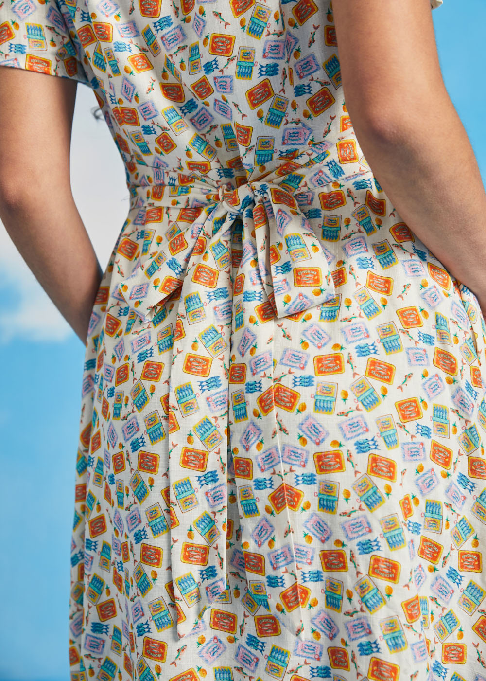 Back tie waist detail on novelty fish print vintage-inspired dress