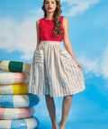 Full-length view of retro-inspired seaside print midi skirt with functional pockets and full silhouette