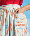Close-up detail of oversized patch pocket on retro seaside print cotton skirt