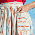Close-up detail of oversized patch pocket on retro seaside print cotton skirt