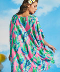Rear angle of pink tropical caftan beach cover-up with watercolor palm print
