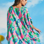 Rear angle of pink tropical caftan beach cover-up with watercolor palm print