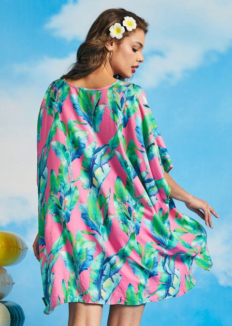 Rear angle of pink tropical caftan beach cover-up with watercolor palm print