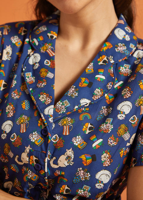 Close-up of a colorful patterned dress with collar