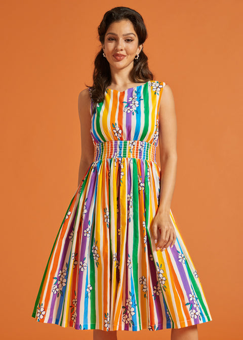 Woman modeling a rainbow stripe fit and flare casual dress