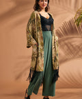 Front view of vintage-inspired fringe duster featuring leopard and palm print.