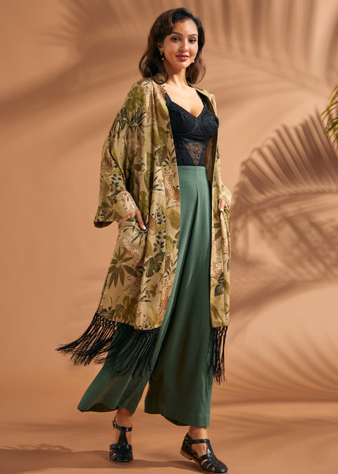 Full-length view of lightweight open-front fringe duster with pockets, layered over casual outfit.