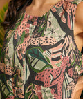 Close-up of the round neckline and wood-look button placket on the jungle print mini dress.