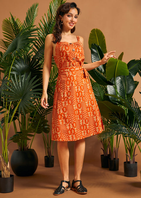 Full outfit featuring a retro orange cotton cami and coordinating wrap skirt.