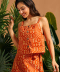 Side view of square neck cotton cami with wide straps and retro silhouette.