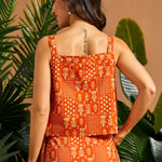 Back view of a vintage-inspired square neck cotton camisole.