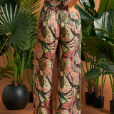 Rear view of jungle cat print palazzo pants showing relaxed fit.