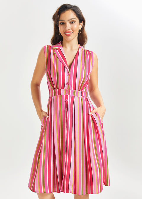 Woman wearing a pink striped summer dress on a white background