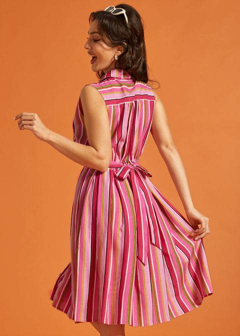Back view of striped midi dress with attached self-tie and elastic back waist.
