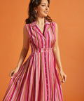 Front view of striped button-front dress with camp collar and vintage-inspired silhouette.