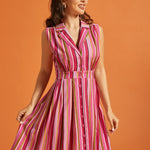 Front view of striped button-front dress with camp collar and vintage-inspired silhouette.