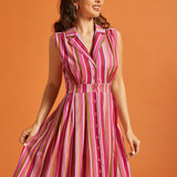 Front view of striped button-front dress with camp collar and vintage-inspired silhouette.