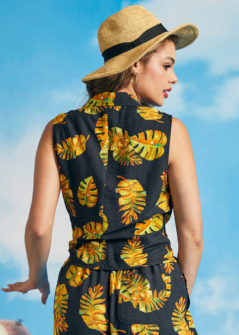 Back view of tropical print sleeveless shirt with convertible collar