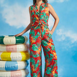 Woman wearing tropical print sleeveless shirt with matching wide-leg pants