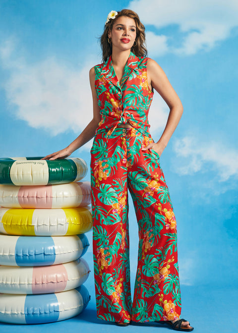 Woman wearing tropical print sleeveless shirt with matching wide-leg pants