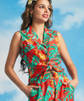 Woman wearing retro Hawaiian-inspired tie-front shirt with convertible collar