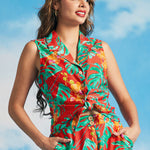 Woman wearing retro Hawaiian-inspired tie-front shirt with convertible collar