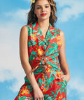 Woman wearing retro tropical button-front shirt with convertible collar
