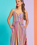 Front view of rainbow stripe midi dress with adjustable straps and fitted bodice