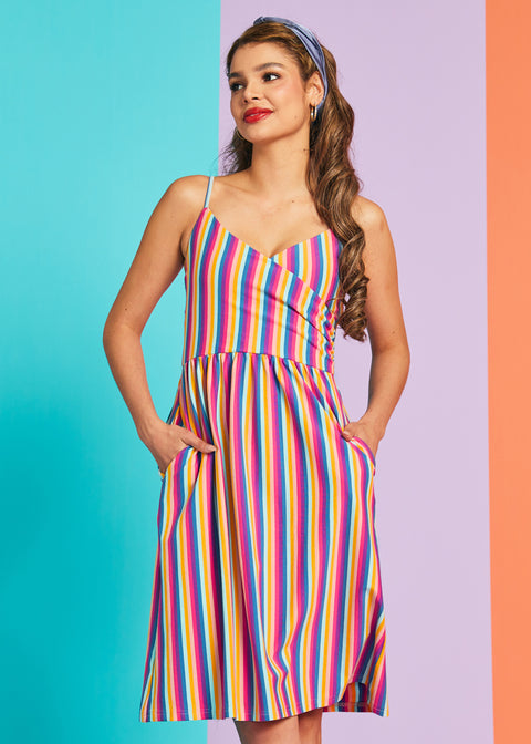 Front view of rainbow stripe midi dress with adjustable straps and fitted bodice