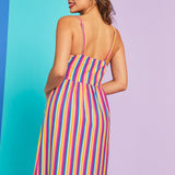 Back view of rainbow stripe midi dress with adjustable straps and midi-length skirt