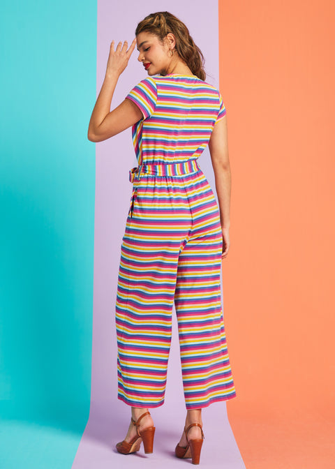 Back view of rainbow stripe wide-leg jumpsuit with short sleeves and elastic waist