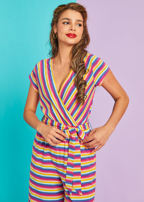 Front view of rainbow stripe wide-leg jumpsuit with short sleeves and pockets