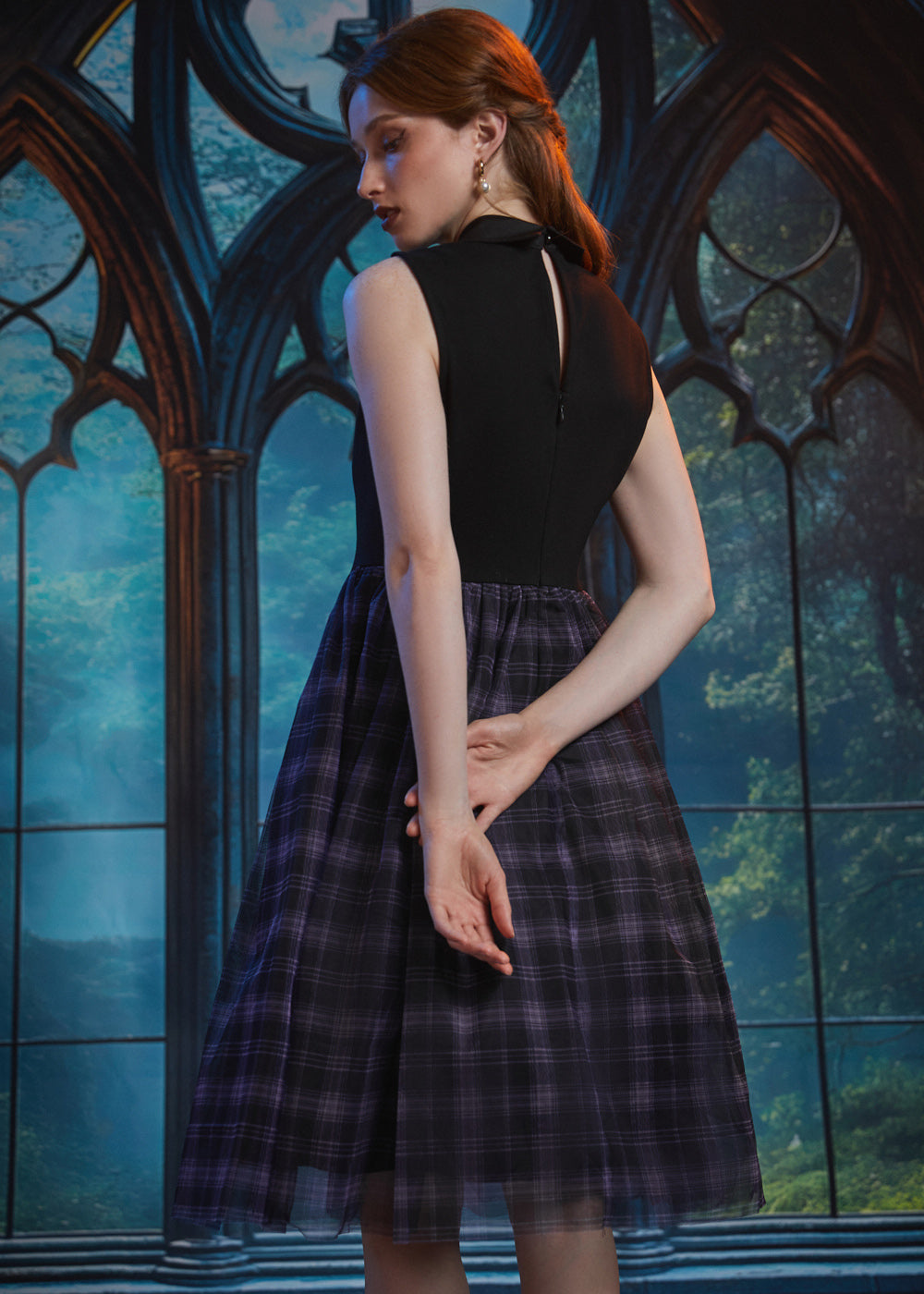 Back view of the Evening Enchantment Fit & Flare Dress featuring a keyhole back, hidden zipper closure, and layered plaid tulle skirt.